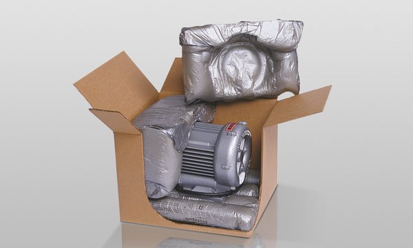 Electric motor securely bedded in INSTAPAK foam cushions in a shipping carton